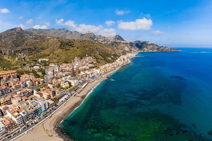 Giardini naxos (taormina) - View with Giardini Naxos and Taormina, Sicily. Beach and sea in summer_2476594187