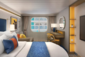 Kajuty s výhľadom na štvrť Surfside (T5) – Legend of the Seas